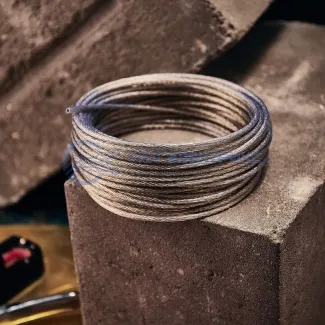 фото Трос стальной в ПВХ оплетке d=4,0 мм, прозрачный ( моток 20 м) REXANT