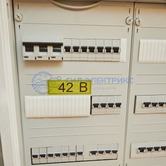 фото Наклейка знак электробезопасности «42 В» 35х100 мм REXANT (7 шт на листе)