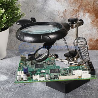 Держатель «Третья рука» REXANT, 2 зажима, лупа 90 мм + 2 х 34 мм, подставка паяльника, LED подсветка фото Держатель «Третья рука» REXANT, 2 зажима, лупа 90 мм + 2 х 34 мм, подставка паяльника, LED подсветка