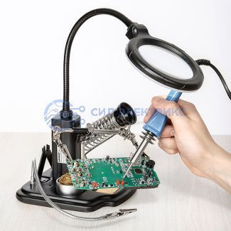 Держатель «Третья рука» REXANT, «МАСТЕР», 3 зажима, лупа 90 мм, подставка паяльника, стенд припоя, LED подсветка фото Держатель «Третья рука» REXANT, «МАСТЕР», 3 зажима, лупа 90 мм, подставка паяльника, стенд припоя, LED подсветка